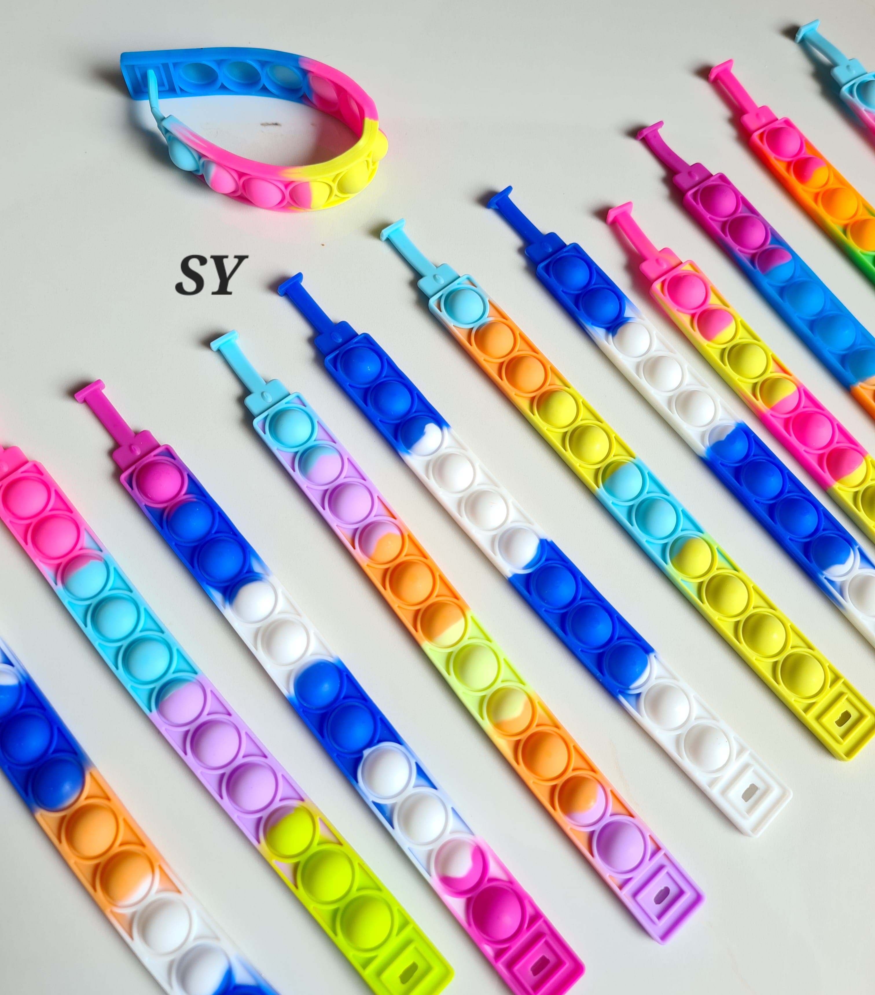 Silicon pop it wrist bands 😍❤