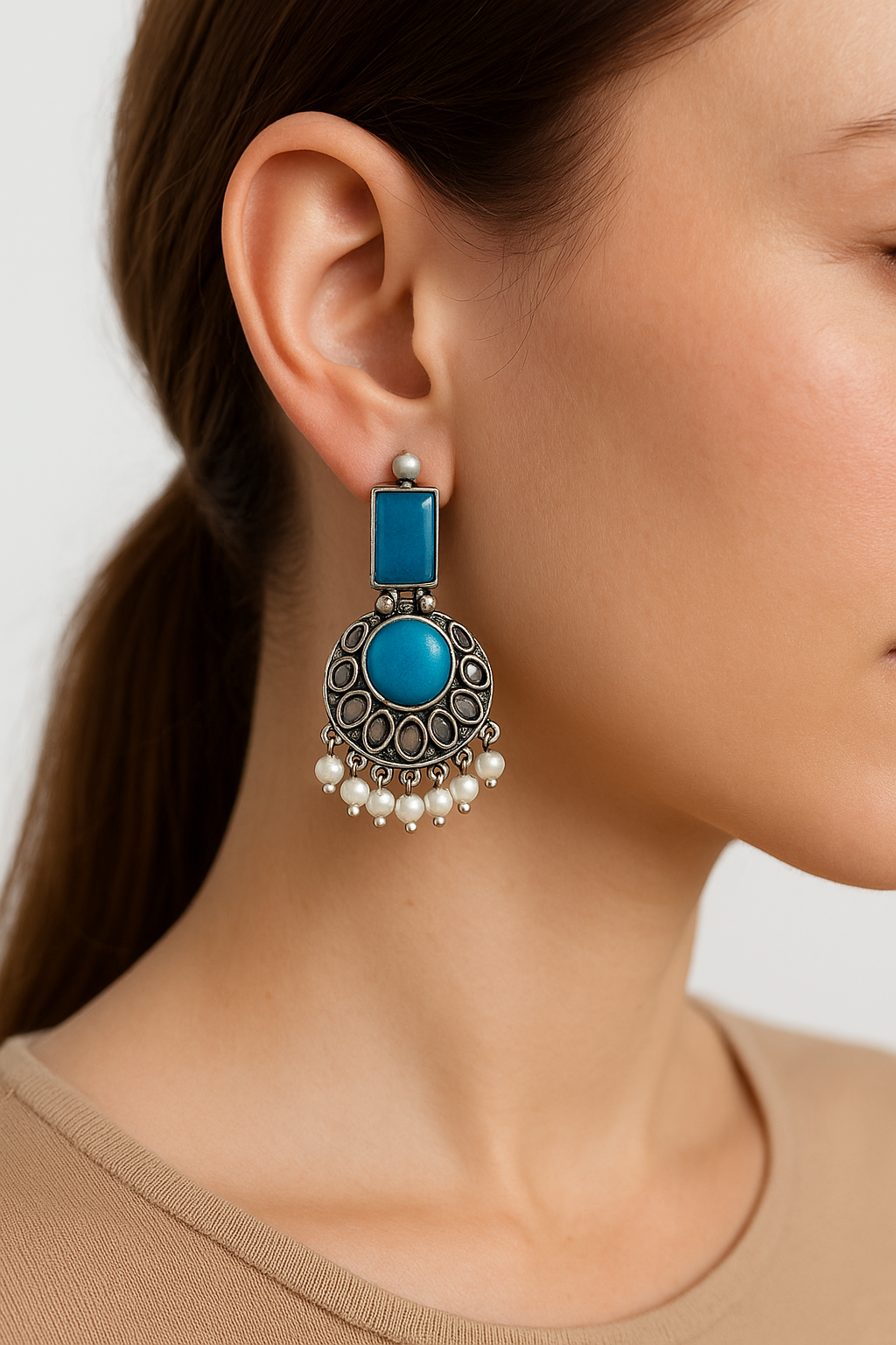 Silver replica earrings,